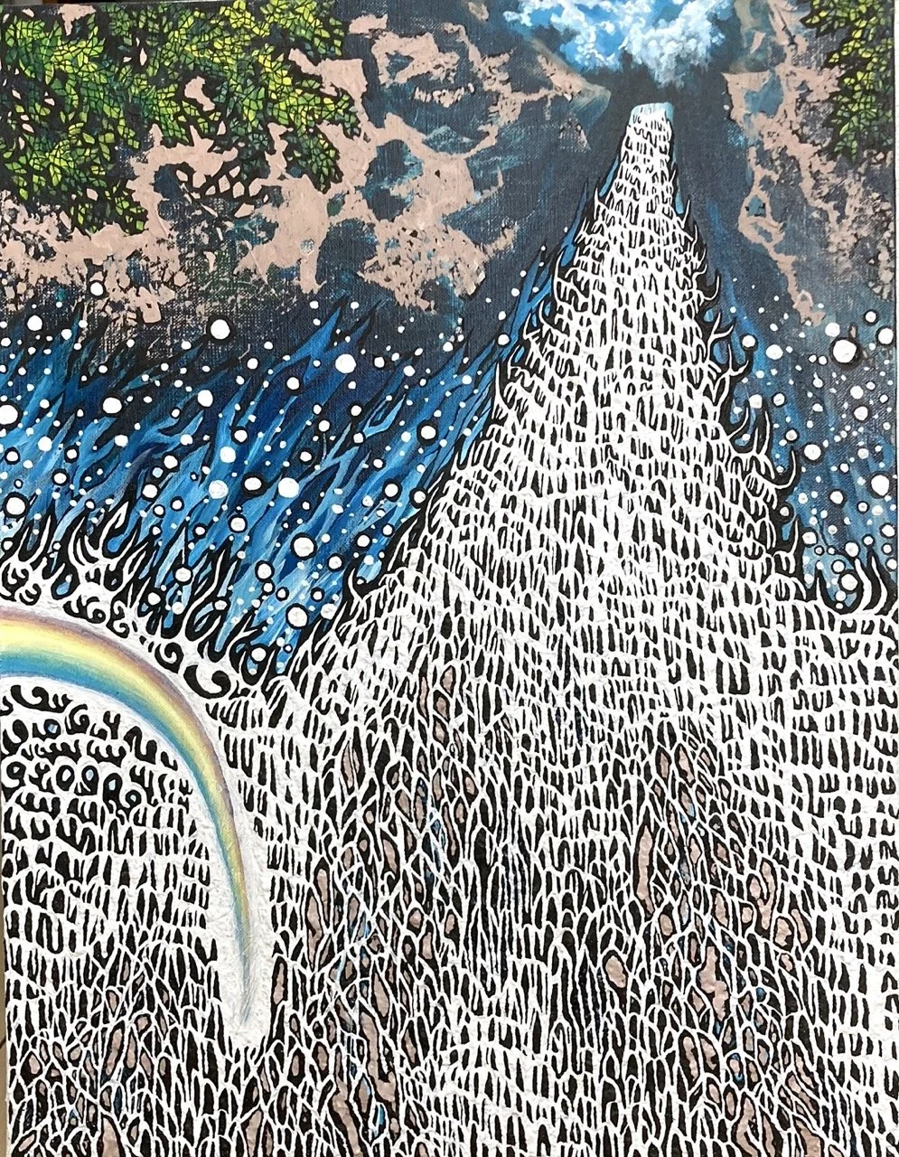 A rainbow over a waterfall 4
