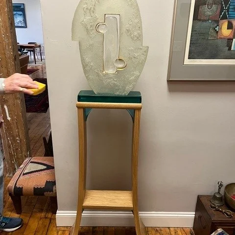 Another piece from our talk last Wednesday, Roger Knudson explained how he needed to design this pedestal for this glass sculpture. His first draft was very artistic and ornate, but he decided that would detract from the art piece itself. He went for