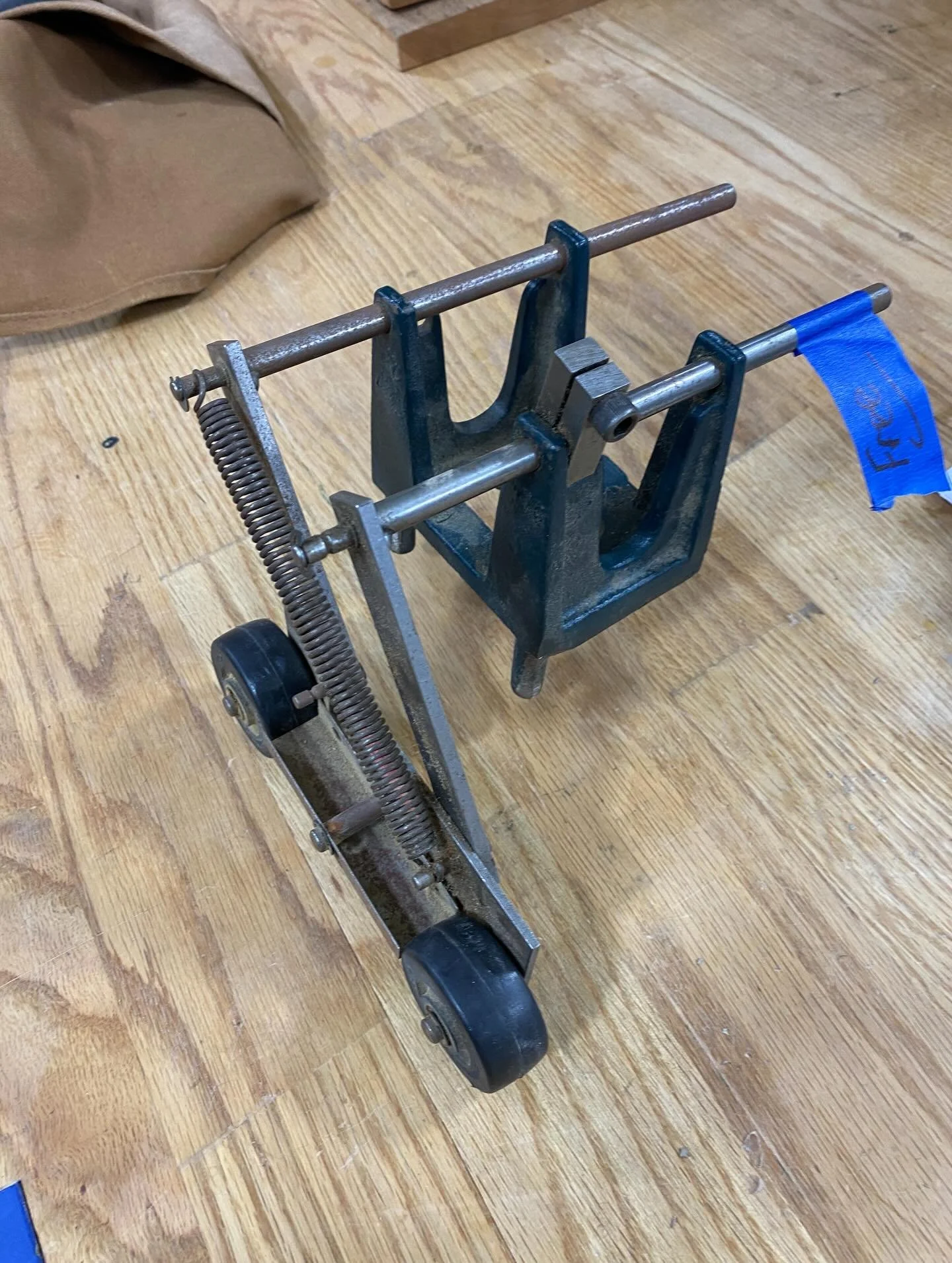 Ok this contraption showed up at open shop tonight. Anyone know what it is? #oldtool #whatisthatthing