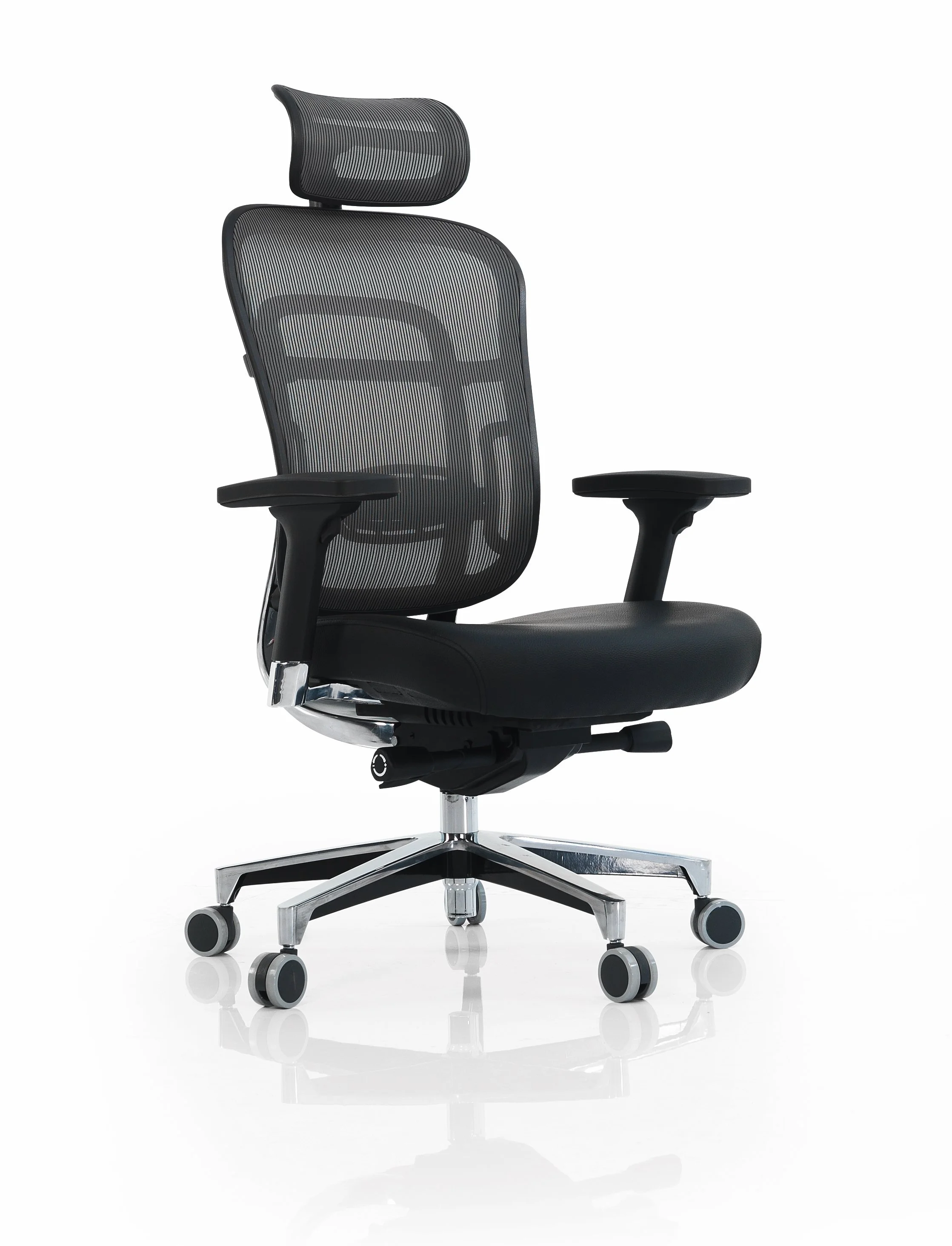 Black ergonomic office chair with adjustable armrests, mesh backrest, and a mesh headrest, placed on a reflective white surface.
