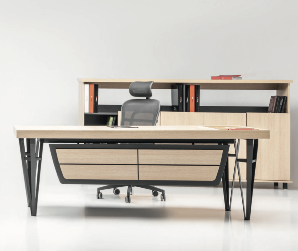 Modern office desk with matching desk chair and a wooden cabinet with books and folders in the background.