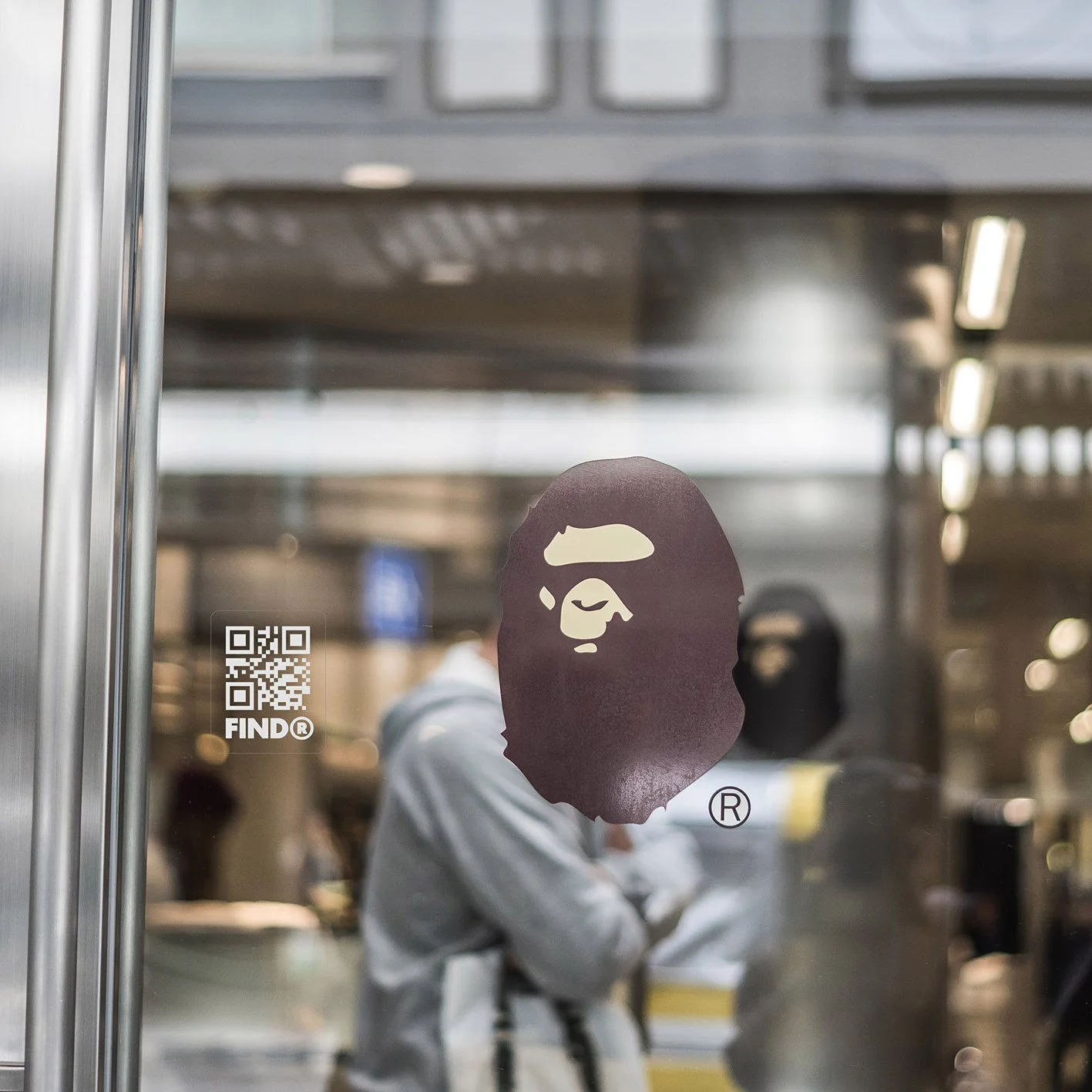 FindR QR code sticker on the window of a café