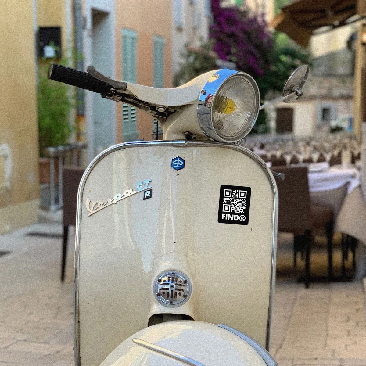 Findr QR code sticker on a vintage vespa