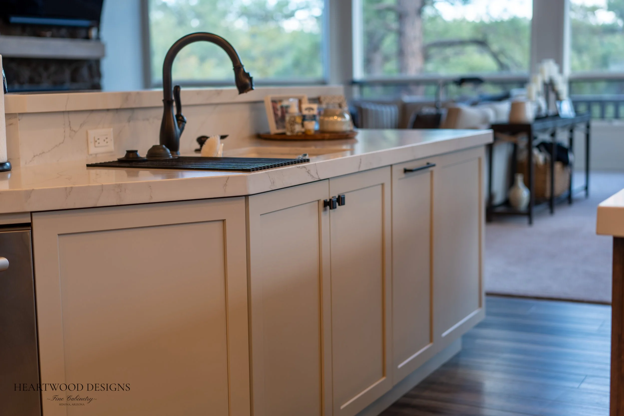 Dark stained knotty alder kitchen island with white painted shaker cabinets in Forest Highlands, Flagstaff AZ
