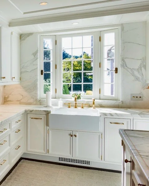 A client absolutely loves white cabinetry, but expressed concern her home would look dated.  I shared these photos from a renovation/addition project in Connecticut:  finely detailed, beautifully crafted cabinets with unusually profiled doors and dra