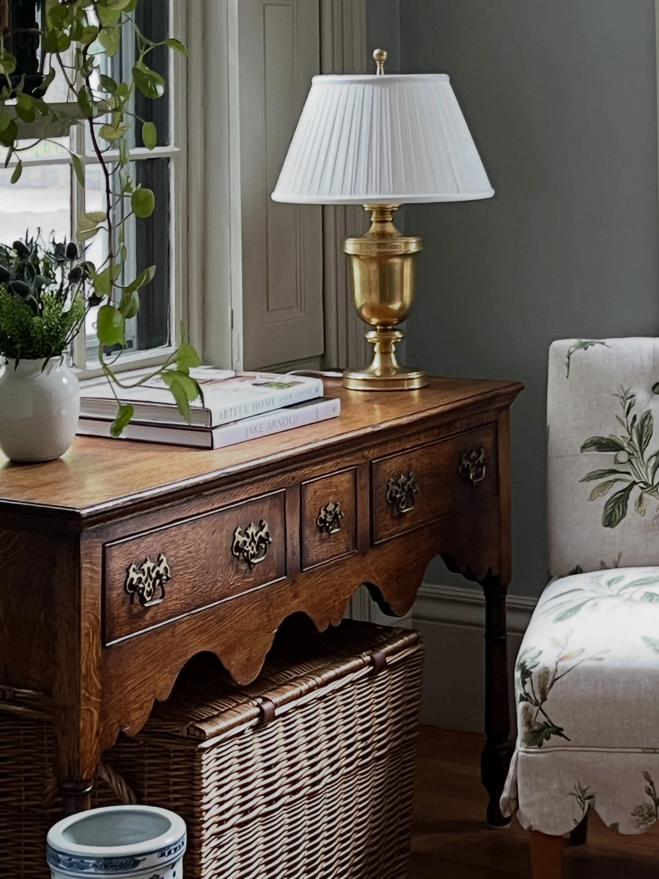 Creating a sweet moment&mdash;a lovely antique English dresser, books, a window from which to gaze &hellip;
