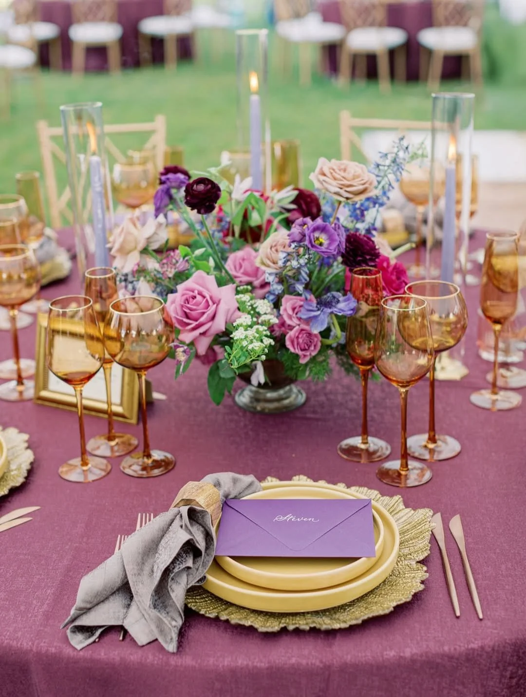 Burgundy place setting with hand-lettered calligraphy envelope place card at Upperville Virginia wedding