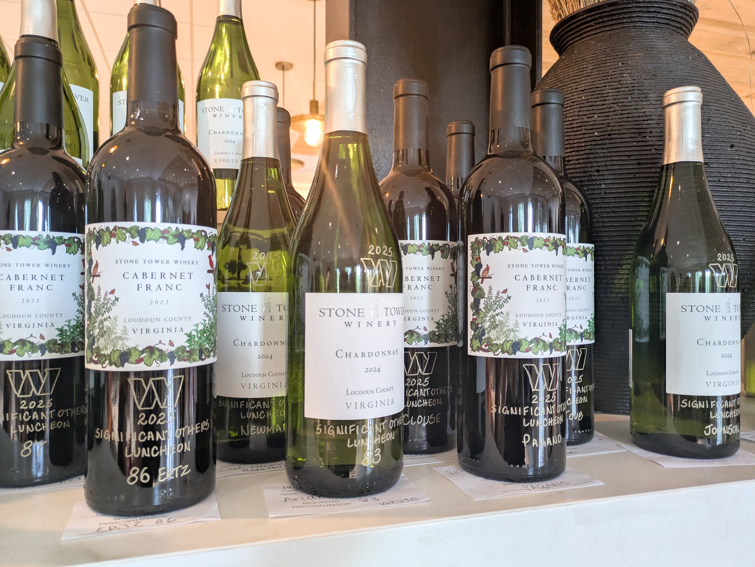 Engraved bottles of wine by Inkwell Scripted for the Washington Commanders at Stone Tower Winery