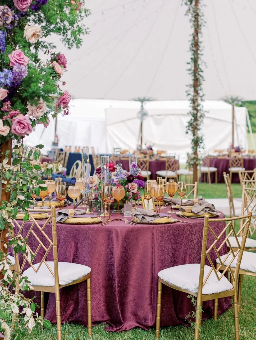 Tented private estate wedding reception with jewel tone décor in Upperville Virginia