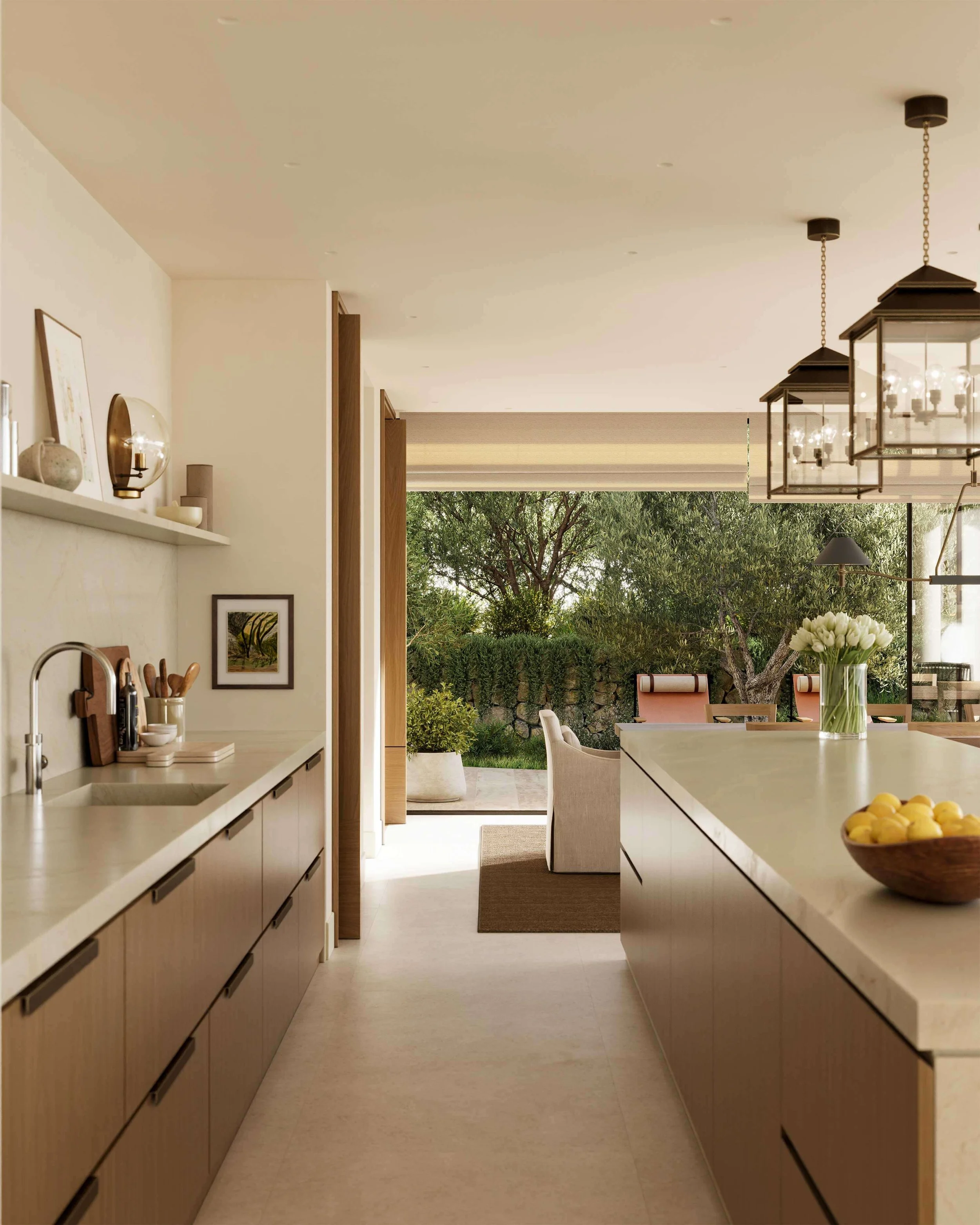 contemporary open-plan kitchen with marble island and views out to the lush green terrace