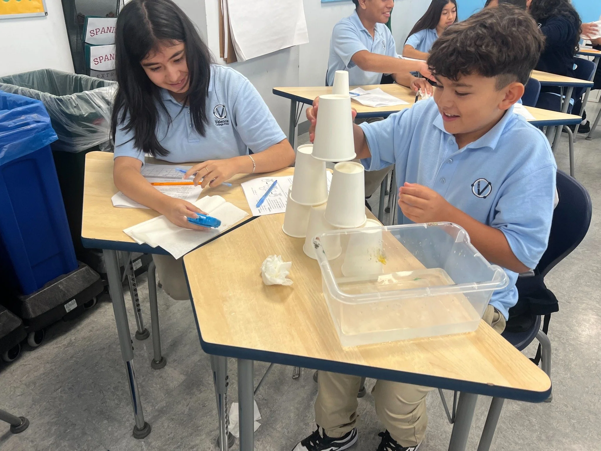 Our 8th Grade Biology scholars put dexterity to the test with cup stacking  discovering how temperature affects performance in real time! ❄