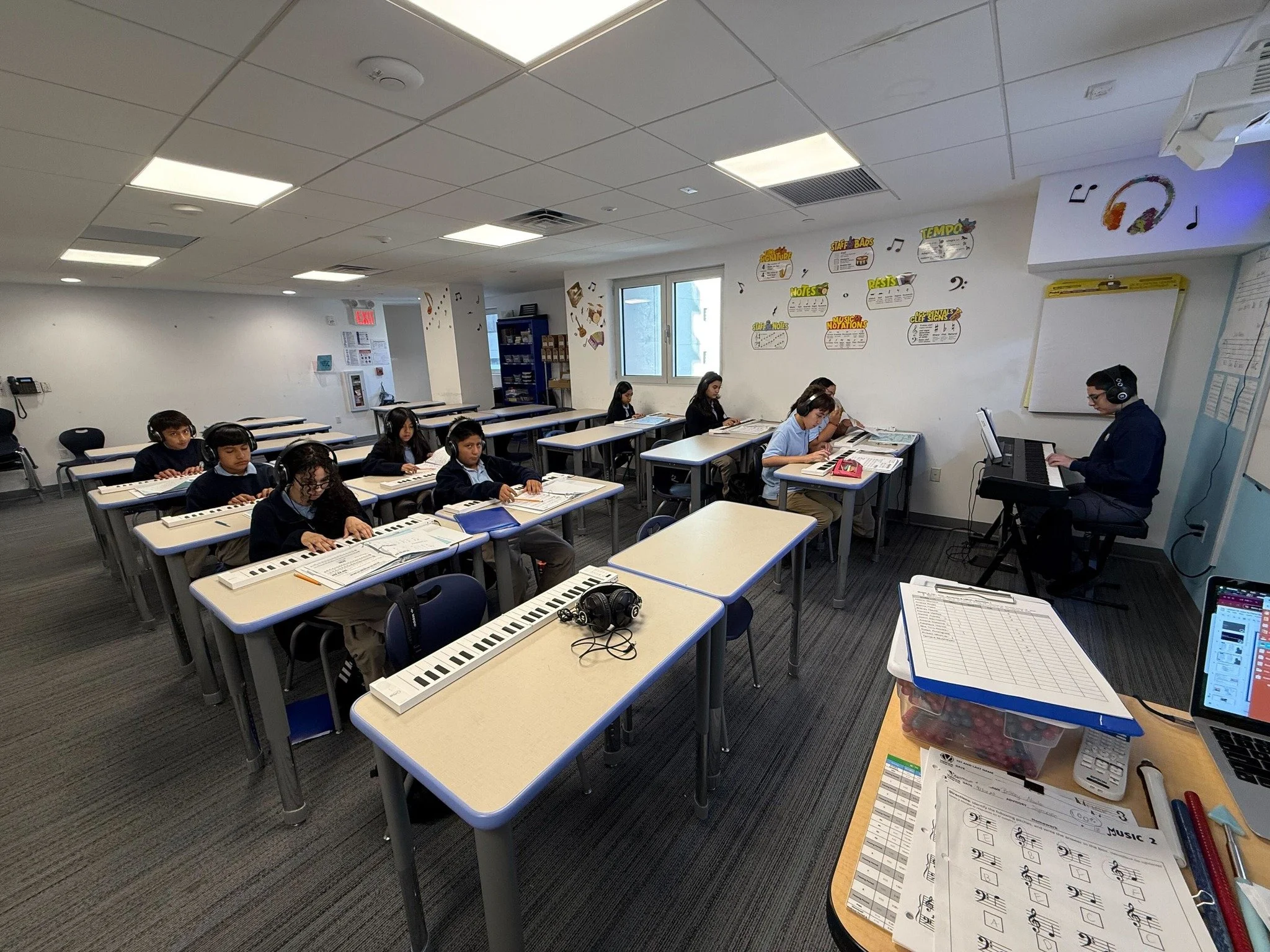 7th Grade Music scholars locked in rehearsing their songs 🎶🎹