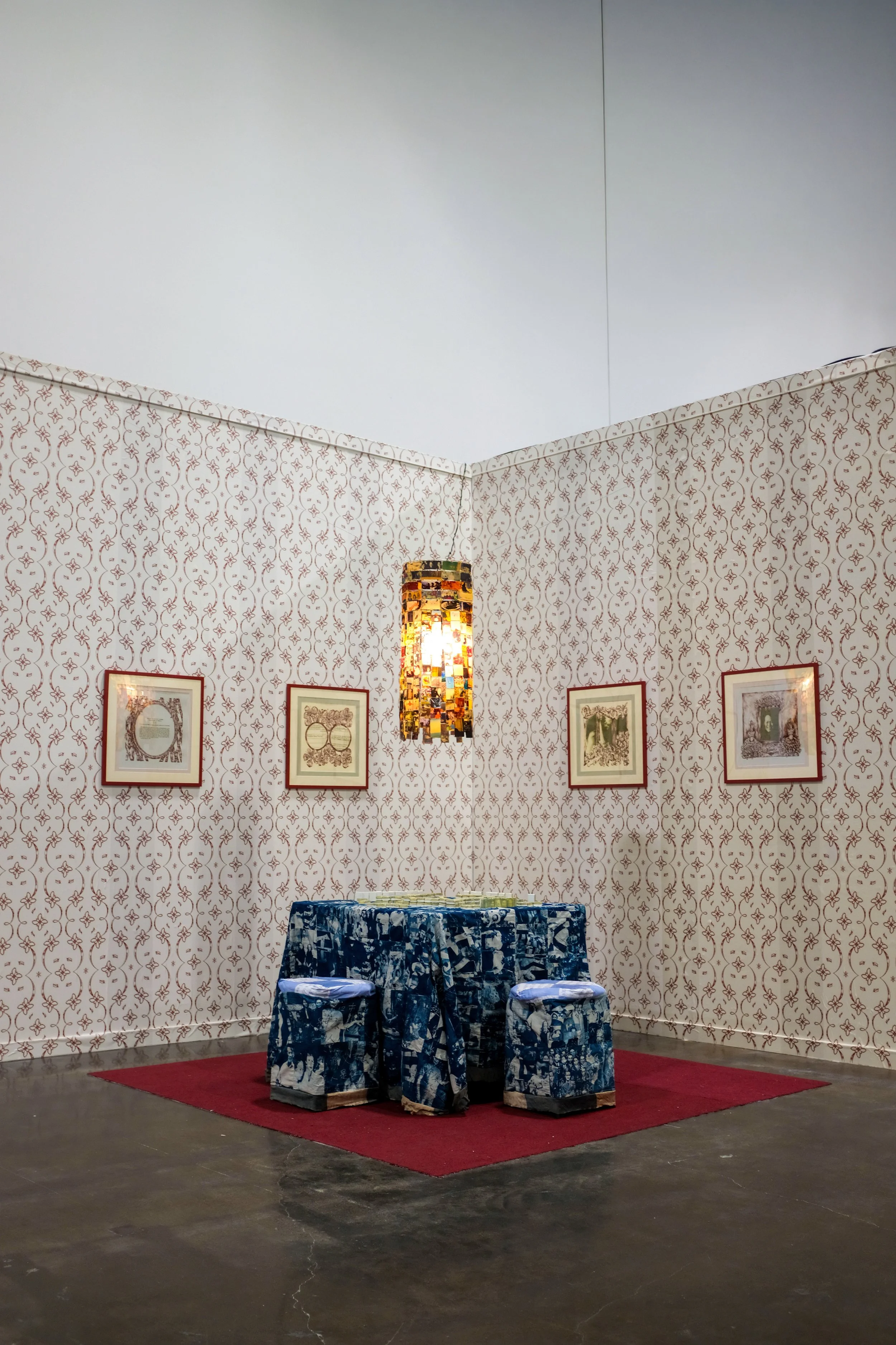 Through You I Will Feel, 2026. Installation; photolithography on BFK Rives paper; inkjet on Photo Tex; cyanotype and natural toning on fabric, UV-dye printing and UV resin on polymer clay; shrink plastic and lighting fixture. 10 feet x 10 feet.
