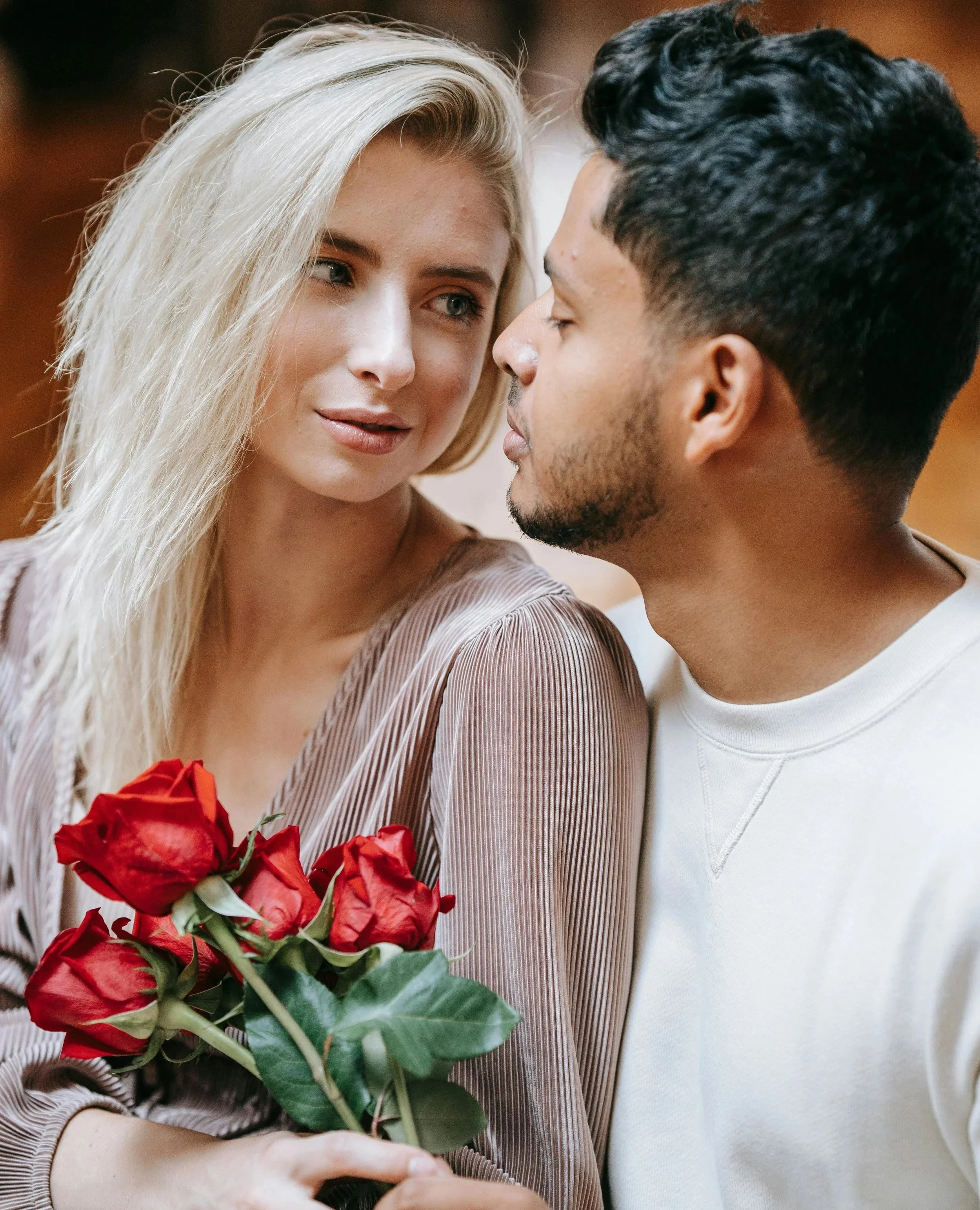 Two people having a calm conversation, illustrating relationship counseling for building emotional connection