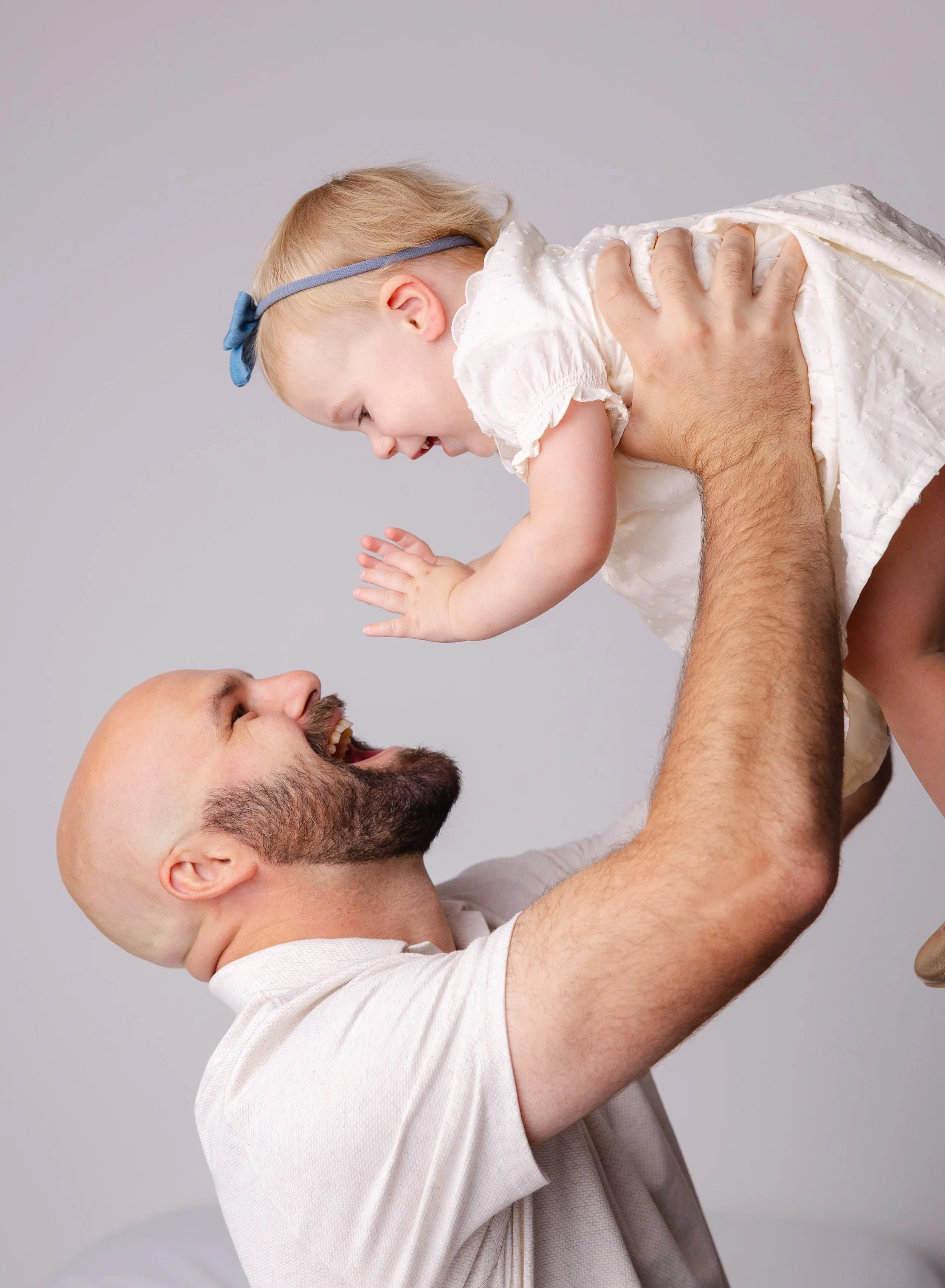 Candid indoor family portrait at EK Simmons Photography studio
