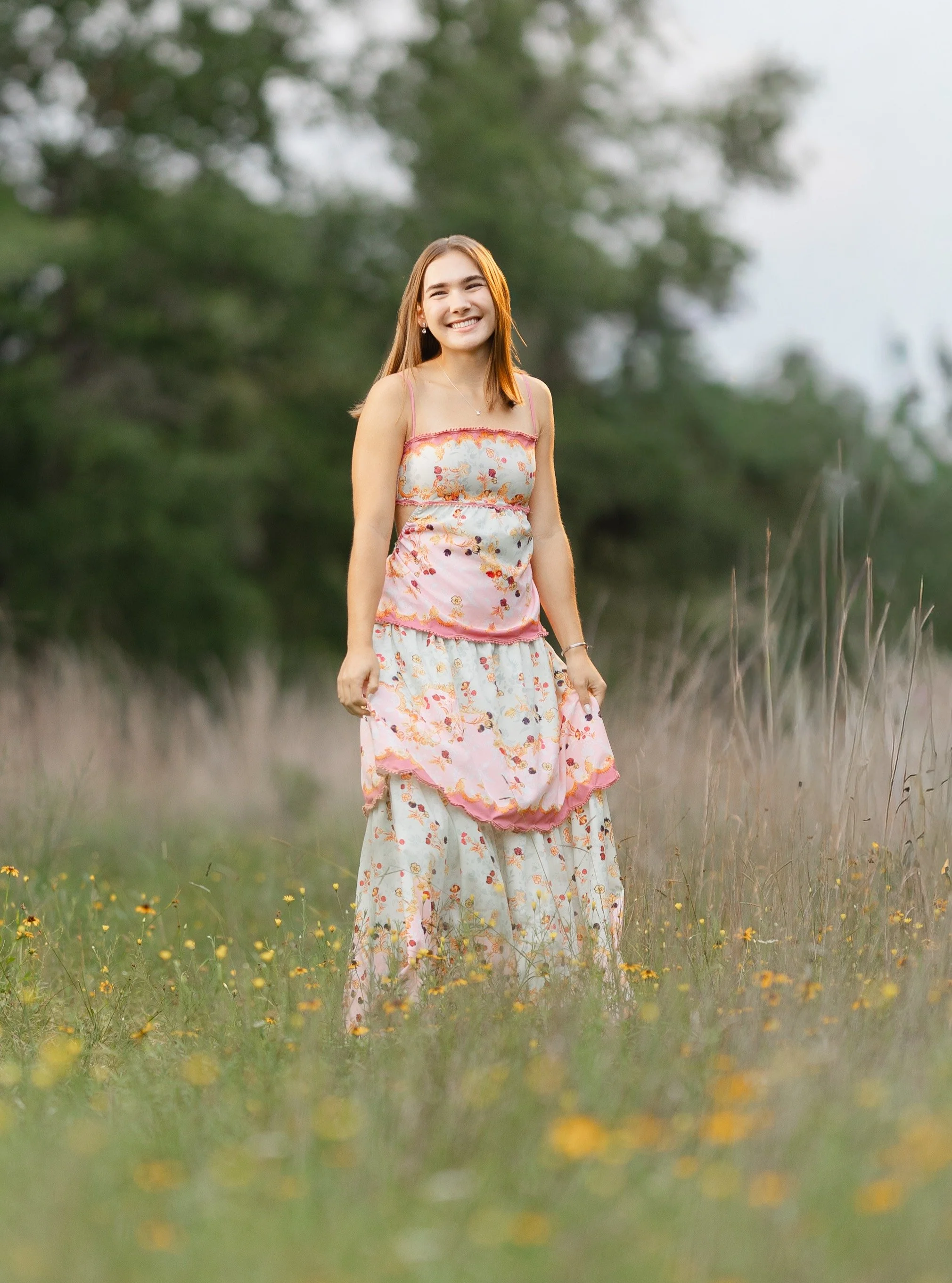 Happy graduation week to all of my 2026 grads! 

Clare was up against some weather, y'all, because Texas is completely unpredictable in the Spring. Her shoot had already been rescheduled once due to bad weather, and the rescheduled date was not rainy