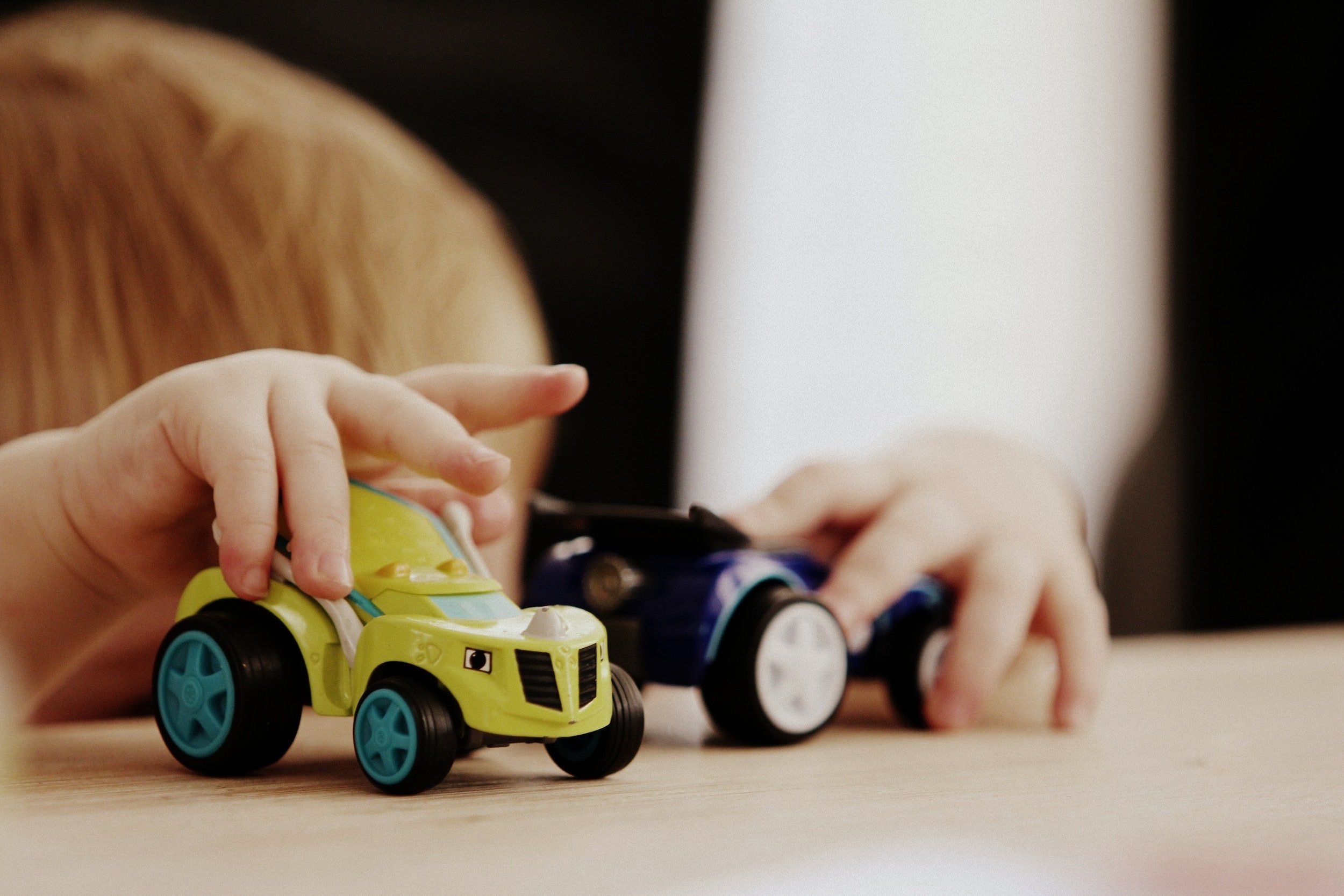 Occupational Therapy for children-The Therapy Arch-Child playing with toy cars.