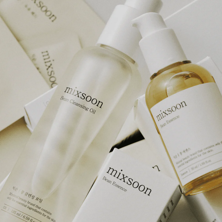 The image shows bottles of Mixsoon skincare products, including Bean Cleansing Oil and Bean Essence, along with their packaging.
