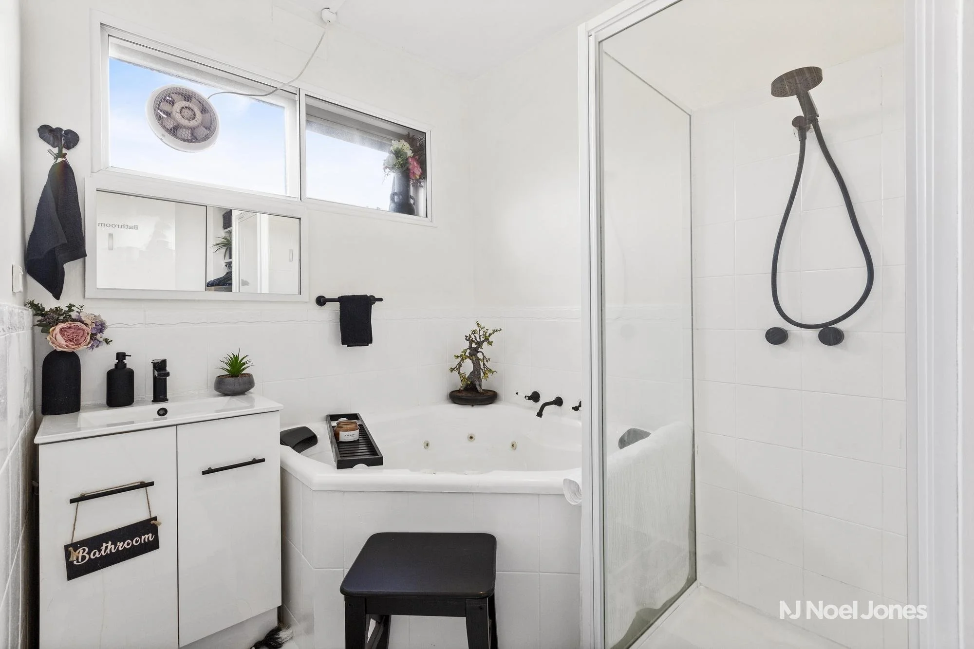 Spa bathroom at 88-92 Victoria Road Hawthorn East featuring modern fixtures and quality finishes. Part of well-maintained residential complex near all Boroondara services.
