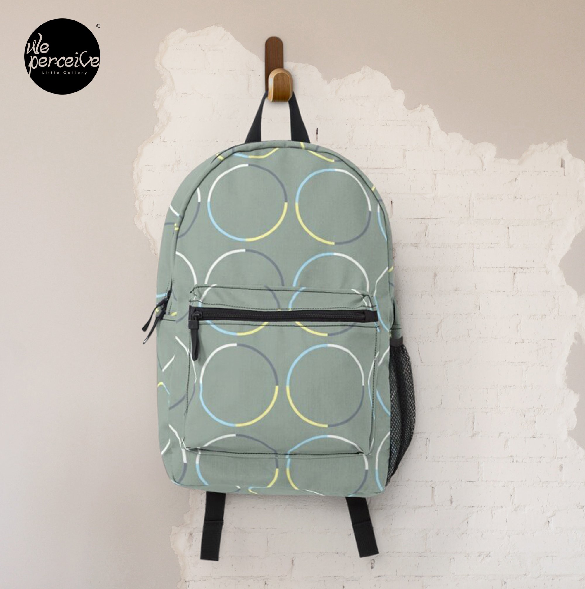 Minimal circle pattern in charcoal backpack front.jpg