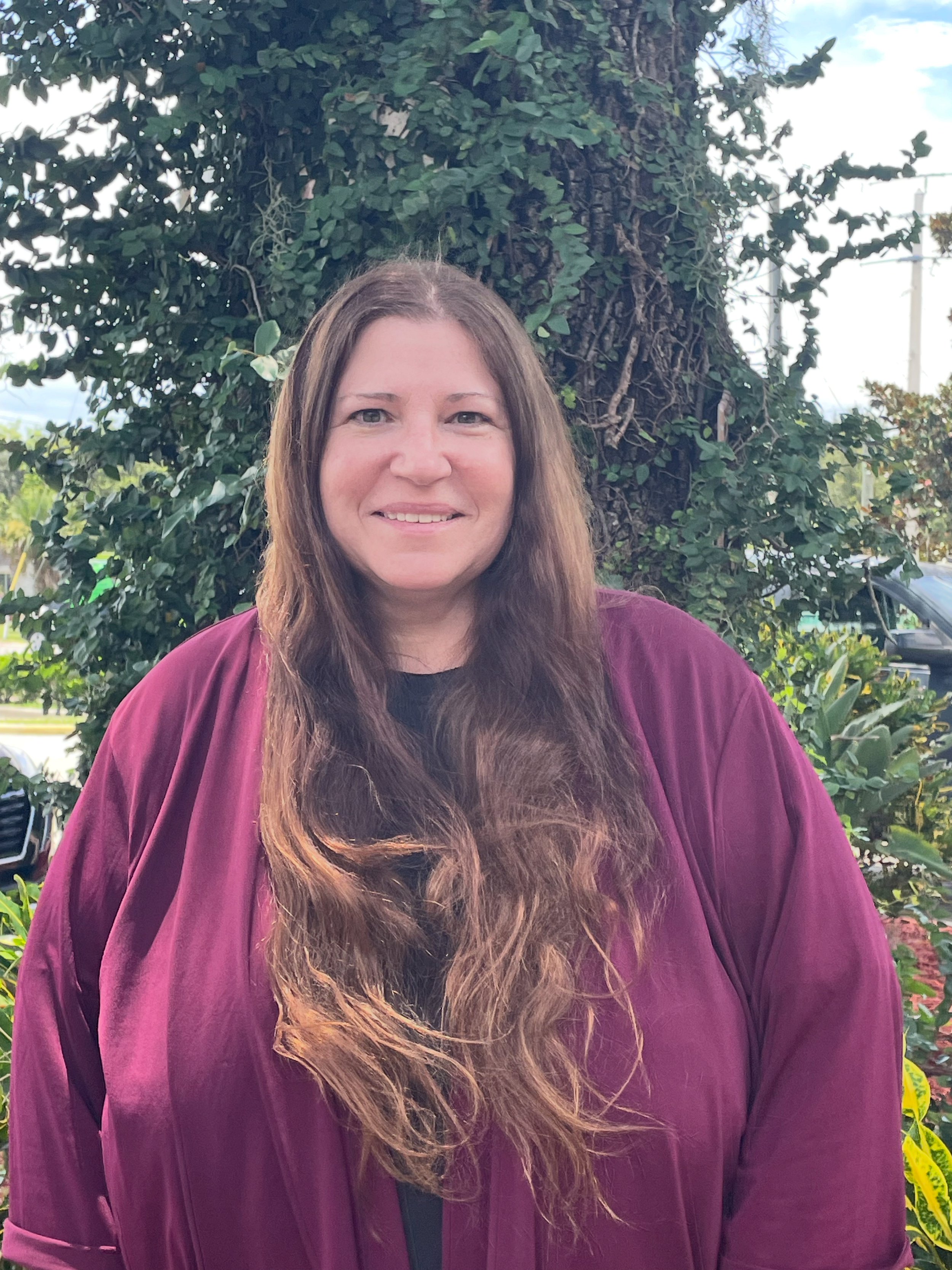 Picture of Ms. Melissa standing outside
