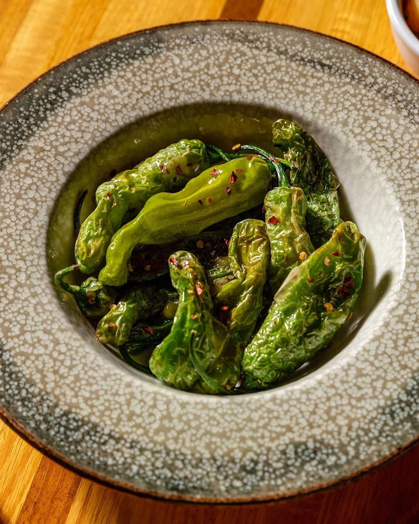 Blistered. Bright. A little heat.

SHISHITO PEPPERS extra virgin olive oil . lemon . oregano . sea salt . chili flakes

Now on the menu. Link in bio to make a reservation.

📸 @_calma_tay
