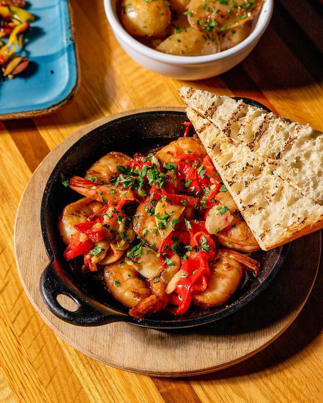 Start dinner the right way.

Shishito Peppers with extra virgin olive oil, lemon, oregano, sea salt and chili flakes. Ajillo Prawns with garlic, fresno chili, parsley, lemon and ciabatta. Just two of the small plates waiting for you.

Mezze, dips, sa