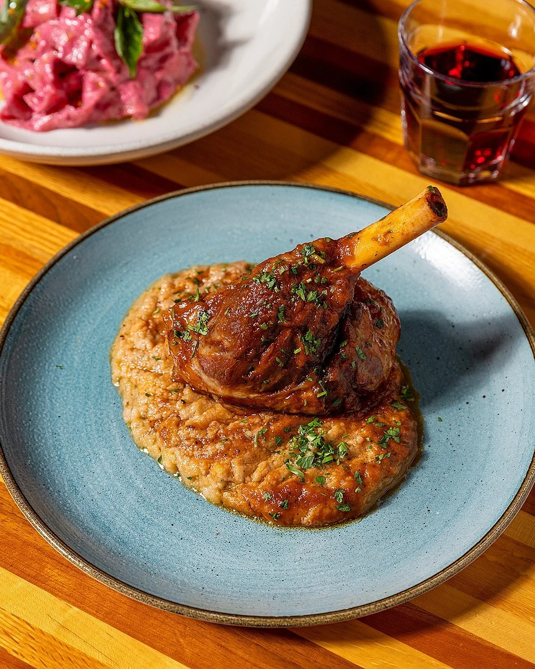 Easter Sunday is this weekend. We're open April 5th from 11am to 7pm with our full menu and a handful of seasonal specials from the kitchen.

Pictured here is our special Braised Lamb Shank with Red wine demi glace, skordalia mashed potato, yukon pot