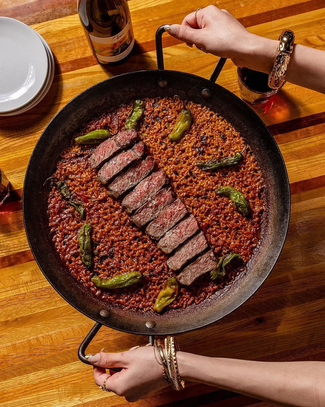 ICYMI >> Paella Tuesdays just got a new option.

Alongside the Valenciana and vegan, you can now build your night around a steak paella, seared NY strip and shishito peppers over saffron rice.

The format is the same coursed prix fixe you know,