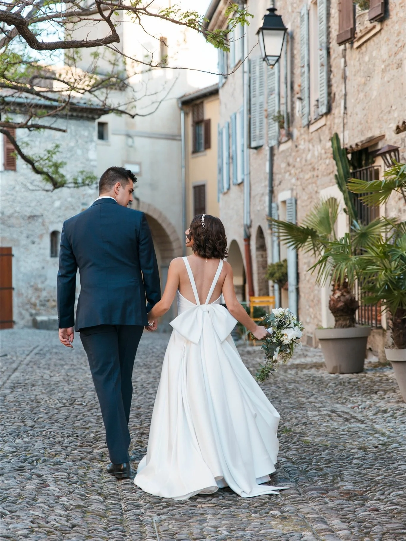 Imagine rehearsing your first dance in the square of a medieval village in the south of France. Pretty unique experience. 
During the bridal portraits part of the day, I asked my bride and groom to use this time to do their first dance alone before t
