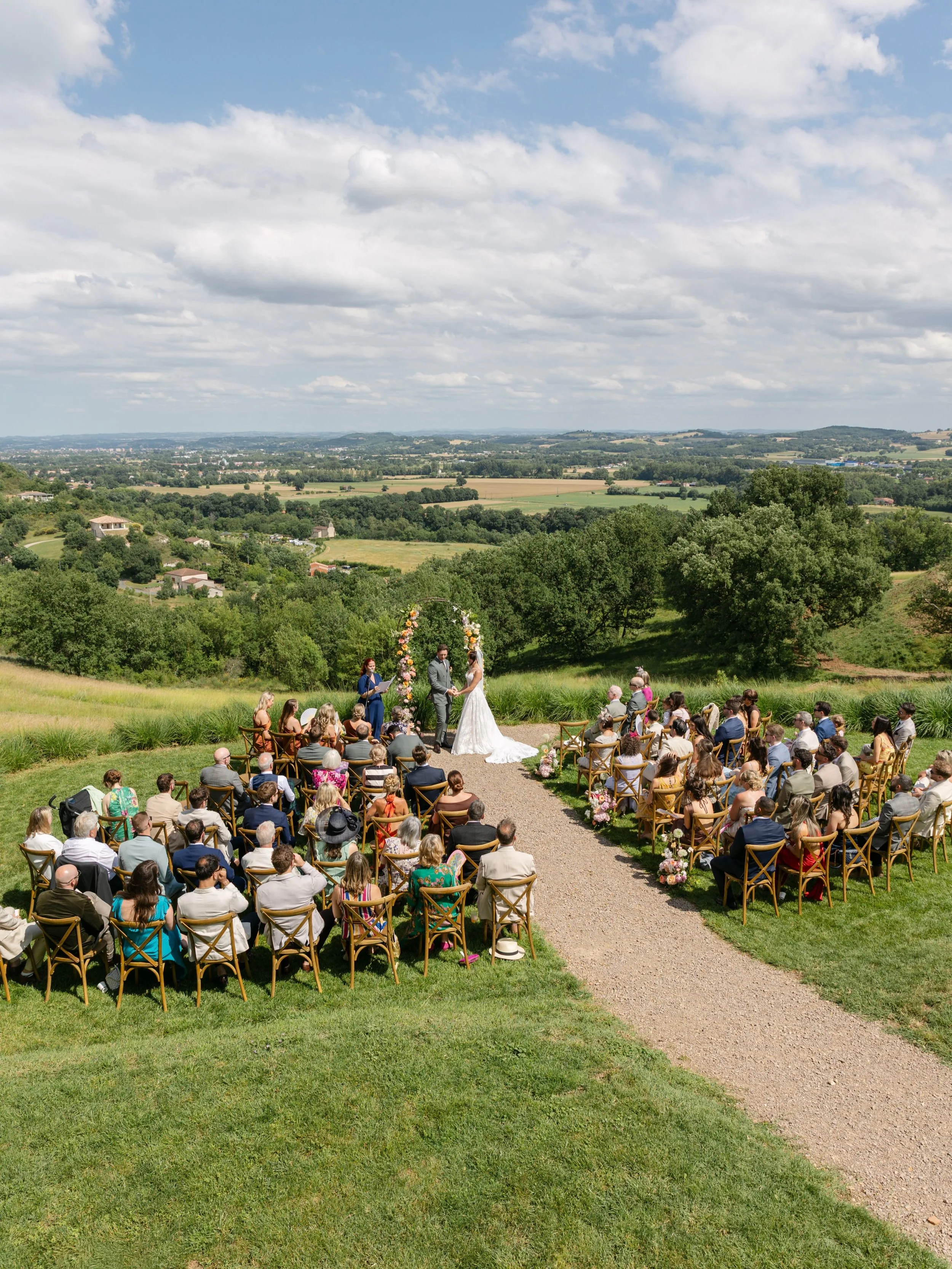 Still dreaming of this incredible wedding ceremony, rolling green hills, dramatic clouds, and all the laughter.

I&rsquo;ve wanted to photograph a bride walking down the aisle with her father from the back to showcase the back of the dress and the gu