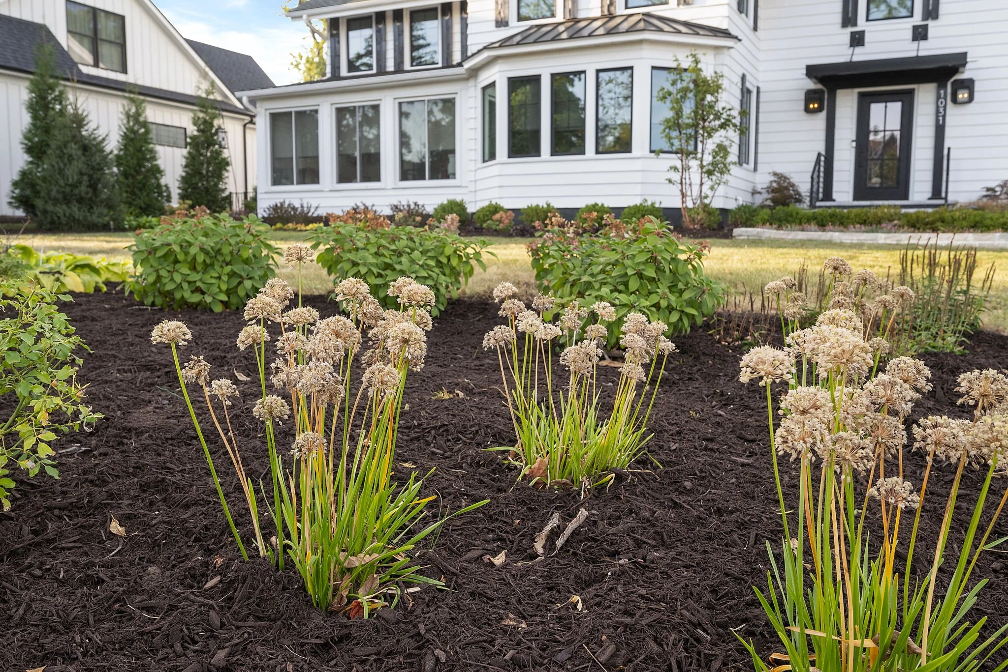 Manicured garden in Naperville, IL, installed by family-owned Montano's Landscaping.