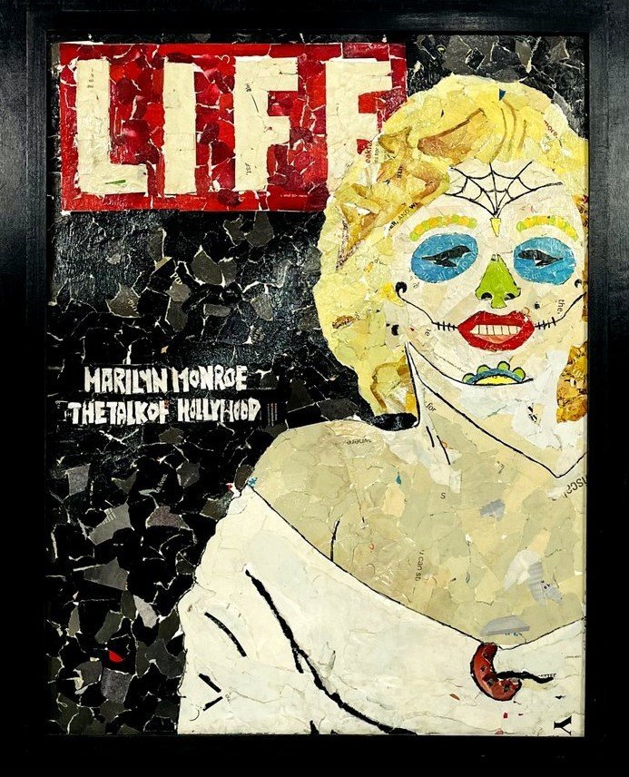 A mosaic art piece featuring a portrait of Marilyn Monroe with Day of the Dead decorated face. The background includes a red and white "LIFE" magazine logo and text that reads "Marilyn Monroe: The Talk of Hollywood."