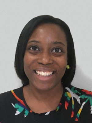 Close-up of a woman with dark hair and dark eyes smiling against a plain white background.