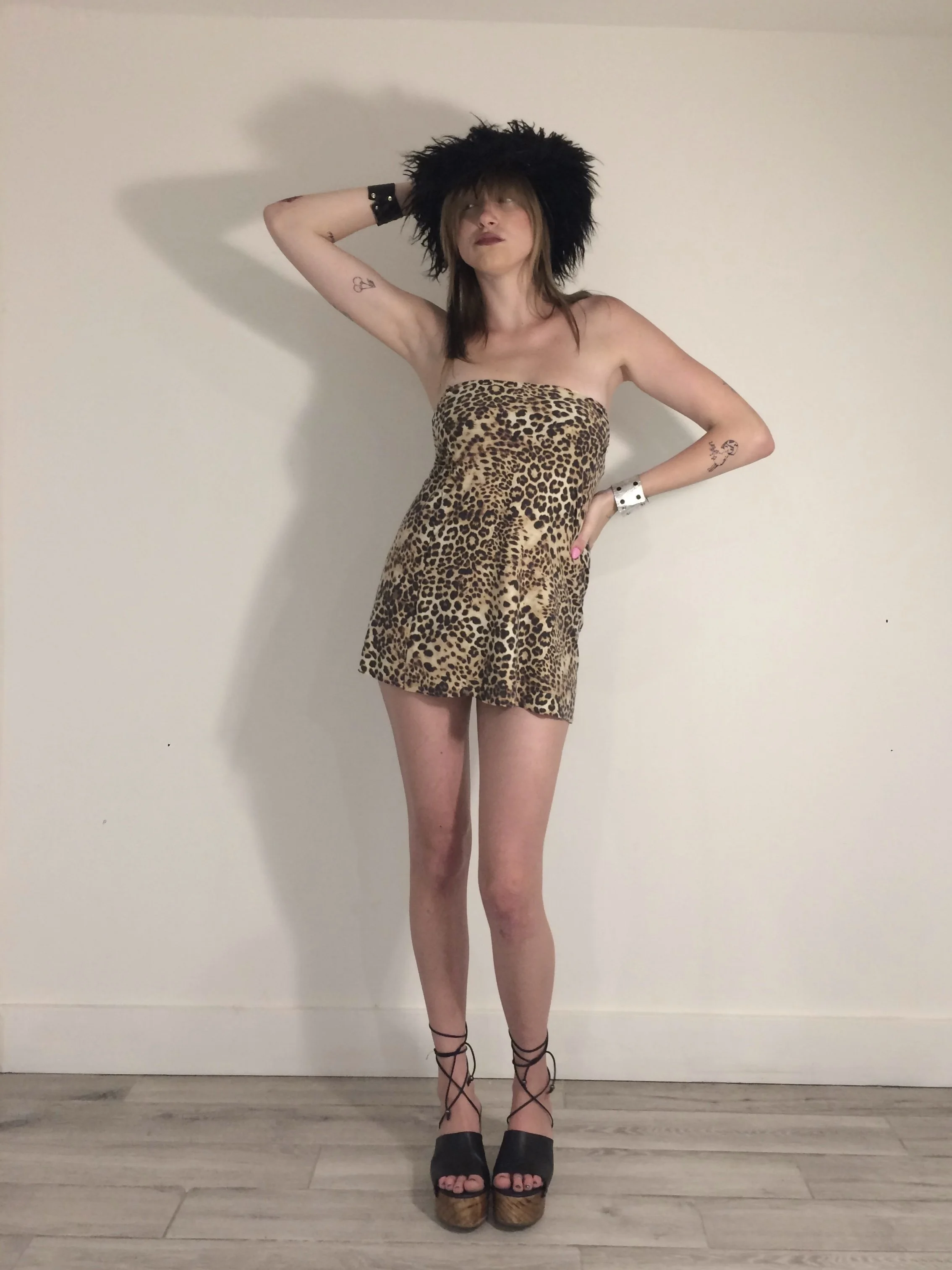 SS25 mini tube dress - cheetah (M)  ☆
fur lined reversible aviator hat - leather/ polka dot (L)  ☆
snap cuffs - black croc, silver