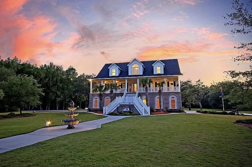 Exterior view of Lovegrove Estate, a waterfront wedding venue near Charleston, South Carolina, at sunset.