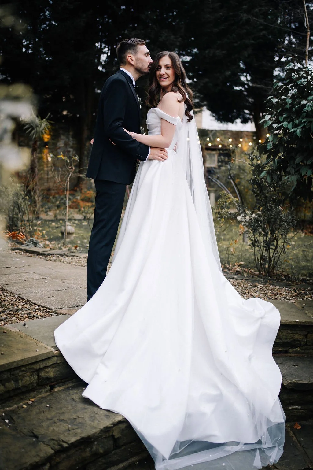 Bride ang Groom having photographs in the garden of Sparth House, Lancashire wedding venue
