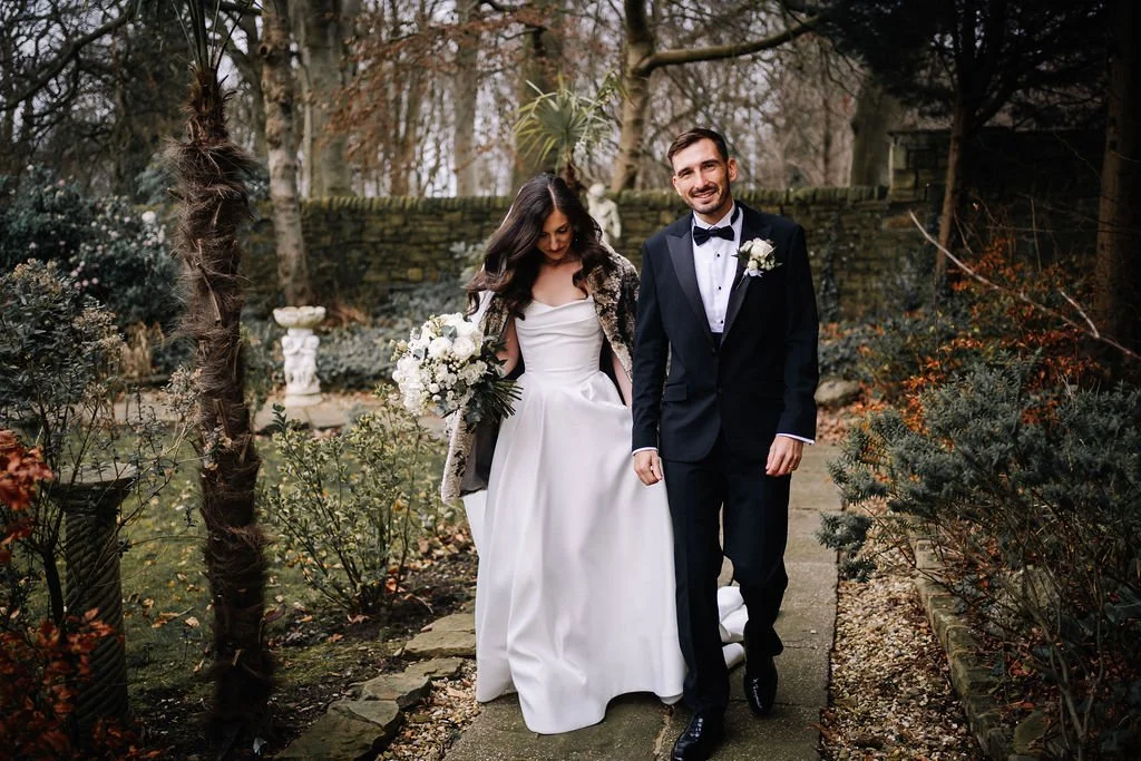 Newlyweds in the gardens of Sparth House Georgian manor wedding venue Lancashire