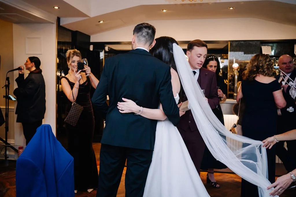 Guests enjoying drinks reception at Sparth House wedding venue near Manchester