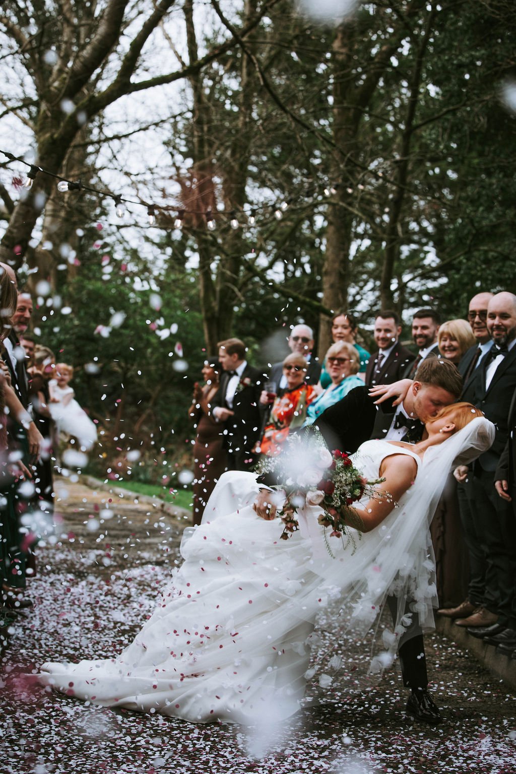 Bride and groom confetti moment at Sparth House wedding venue Lancashire