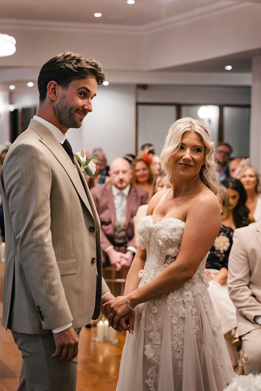 Bride and groom exchanging vows at Sparth House wedding venue