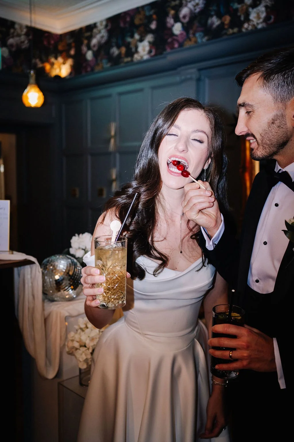 Bride and groom enjoying Drunk in Love cocktail bar at Sparth House wedding venue Lancashire