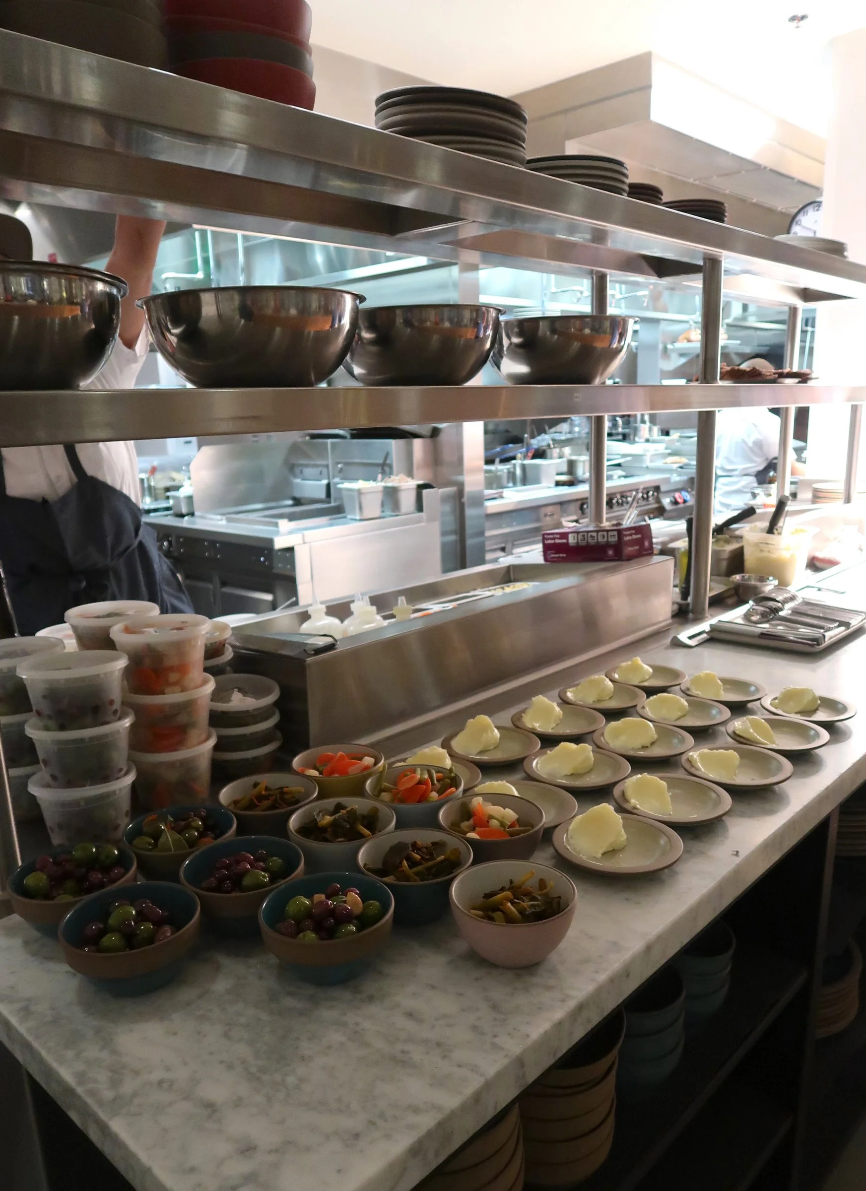 Food is prepared for service in a space designed by KRBS. 