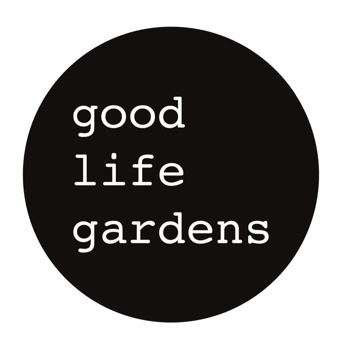 Black circular badge with white text that reads 'good life gardens'.