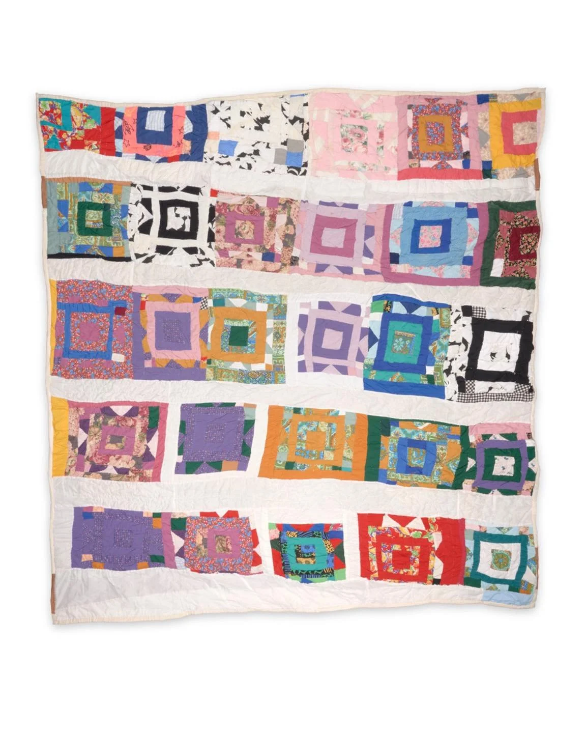 Mertlene Perkins, Pig Pen Block Style

This quilt reflects a lifetime rooted in place. Although Alabama Route 5 in Alberta is home to several remarkable quiltmakers, Mertlene Perkins is the only one who has lived there her entire life. Born nearby an