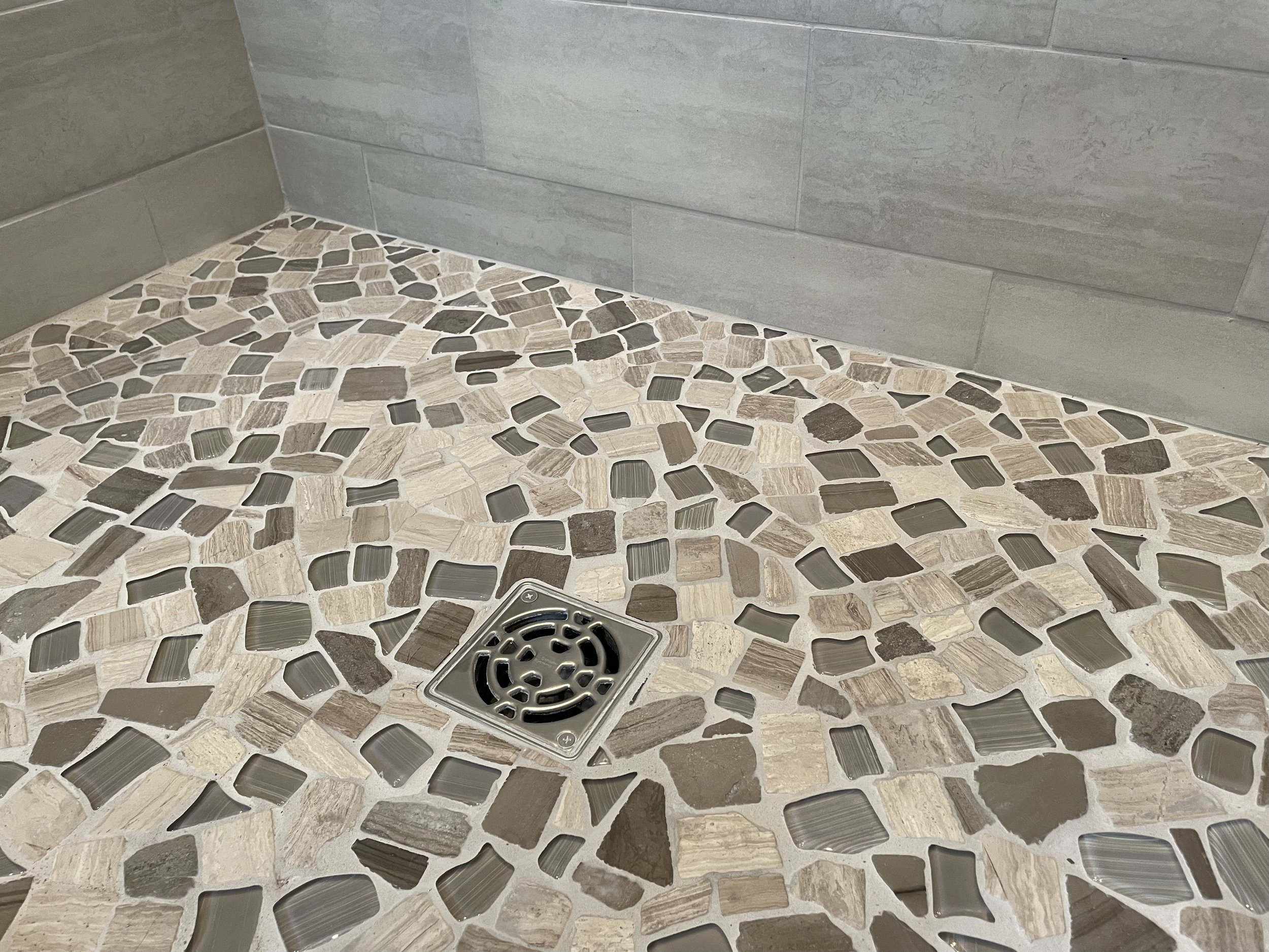 Stone and Glass Mosaic Shower Floor