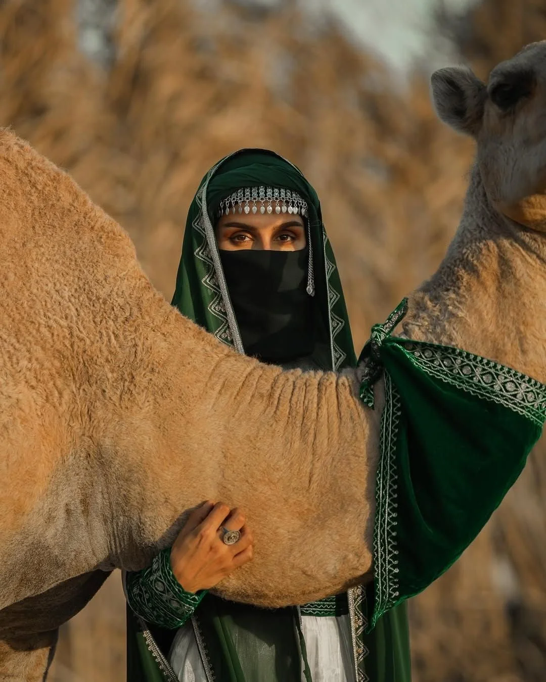 Her photography has been featured in Bab Samhan, Diriyah, where her close-up studies of ceremonial horses translate regional heritage into striking framed artworks.