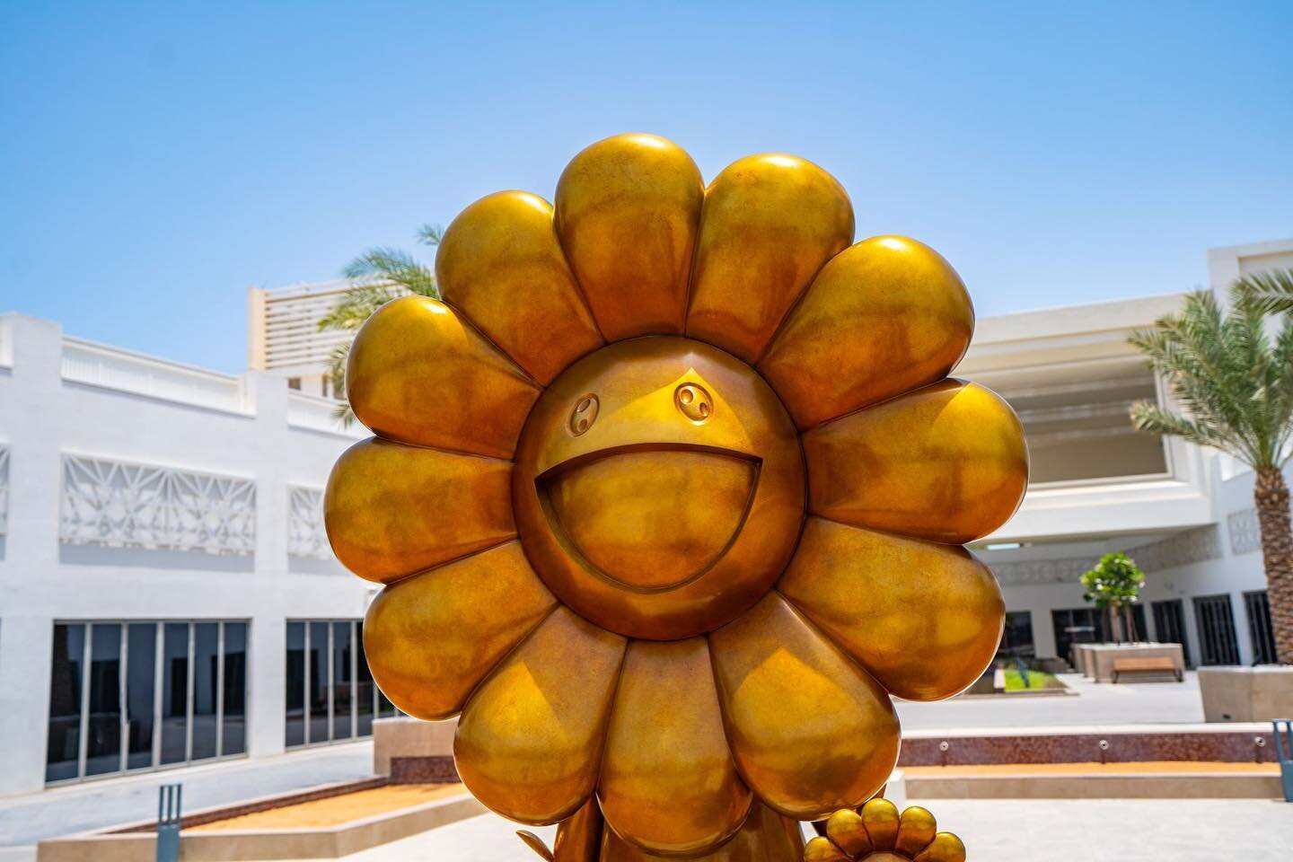 Flower Parent and Child sculpture by @takashipom
 
.
The following sculpture created by the Japanese artist Takashi Murakami @takashipom is located in Yas Bay, Abu Dhabi.
.
The Flower Parent and Child sculpture is a metallic and gold leaf piece stand