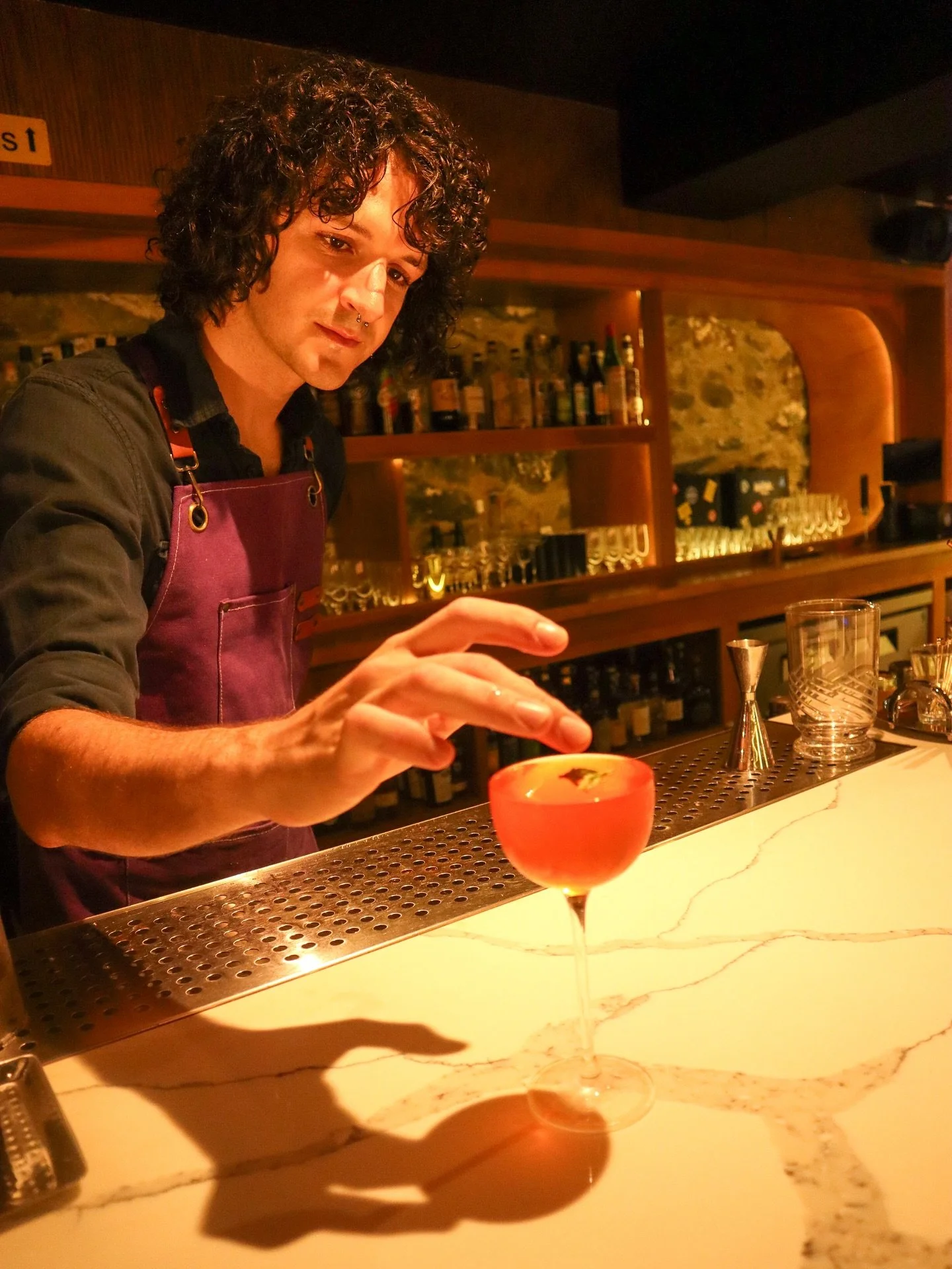 #meettheteam 
.
Marco de Laforcade is quickly coming up on their two year anniversary with us, with no prior bartending experience, they quickly adjusted to their surroundings and we are proud to call Marco a full point member of our bar team!
.
In j