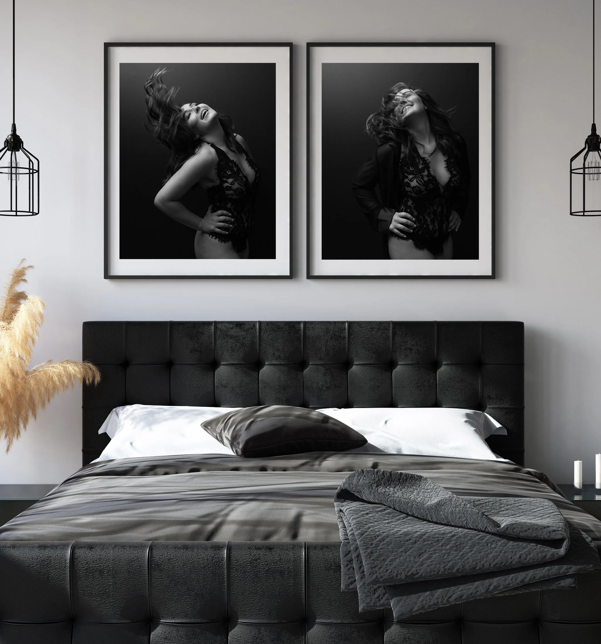 Decorative black-and-white photographs of a woman smiling and laughing, hanging above a black leather bed headboard in a modern bedroom. Two hanging pendant lights are on either side of the photographs.